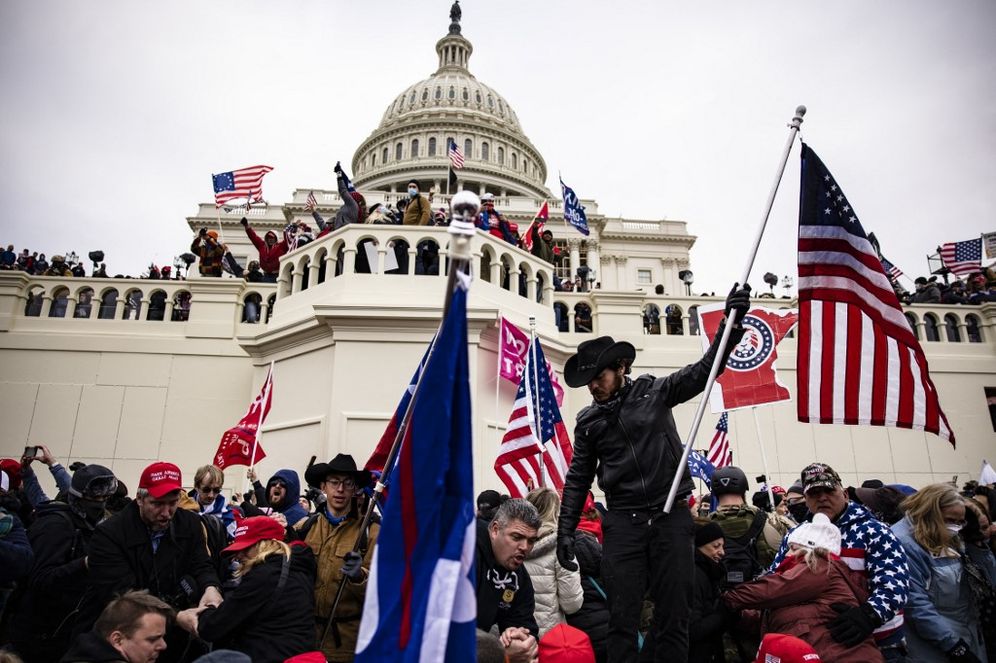 Pro-Trump supporters storm the US Capitol following a rally with former president Donald Trump on January 6, 2021 in Washington, DC, US.