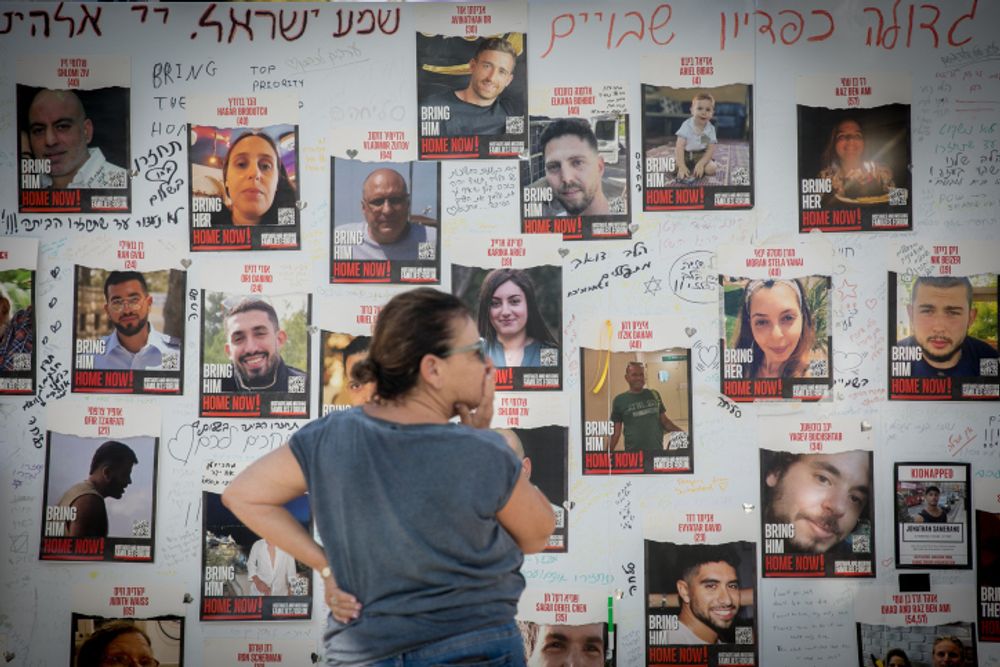 Photographs of the hostages held by Hamas in Gaza, outside the art museum of Tel Aviv, Israel.