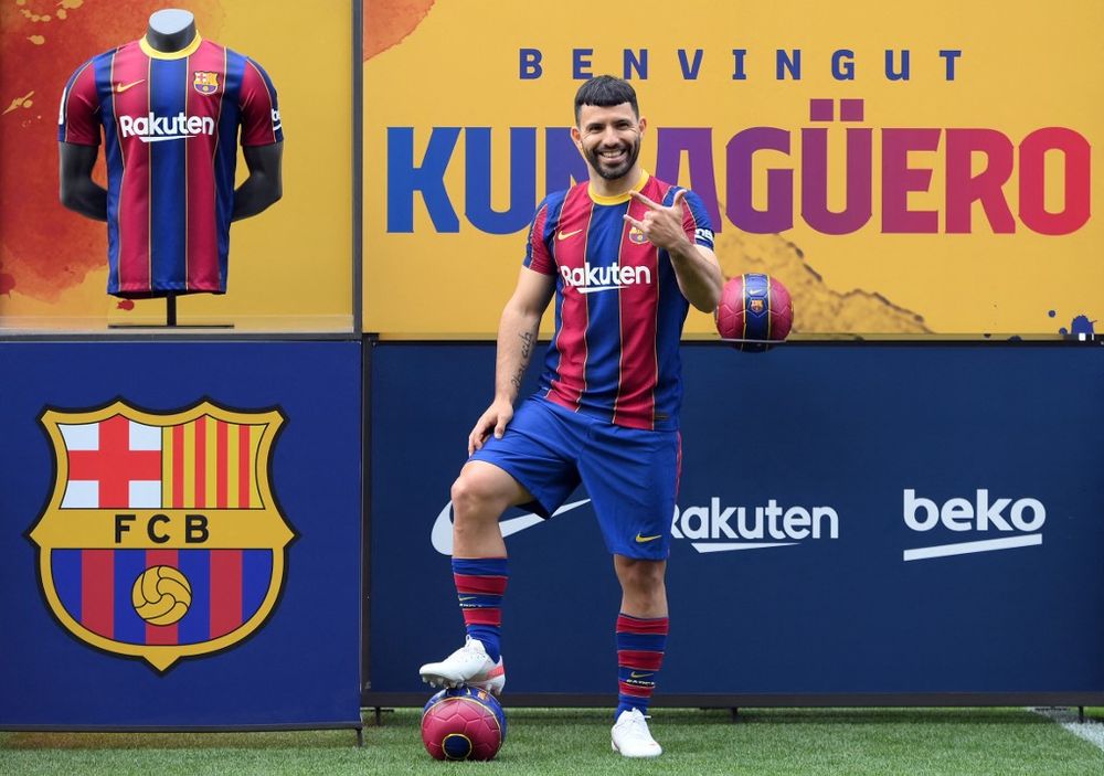 In this file photo taken on May 31, 2021 former Manchester City forward Sergio Aguero poses on the pitch of the Camp Nou stadium in Barcelona, Spain, as a new player for FC Barcelona.