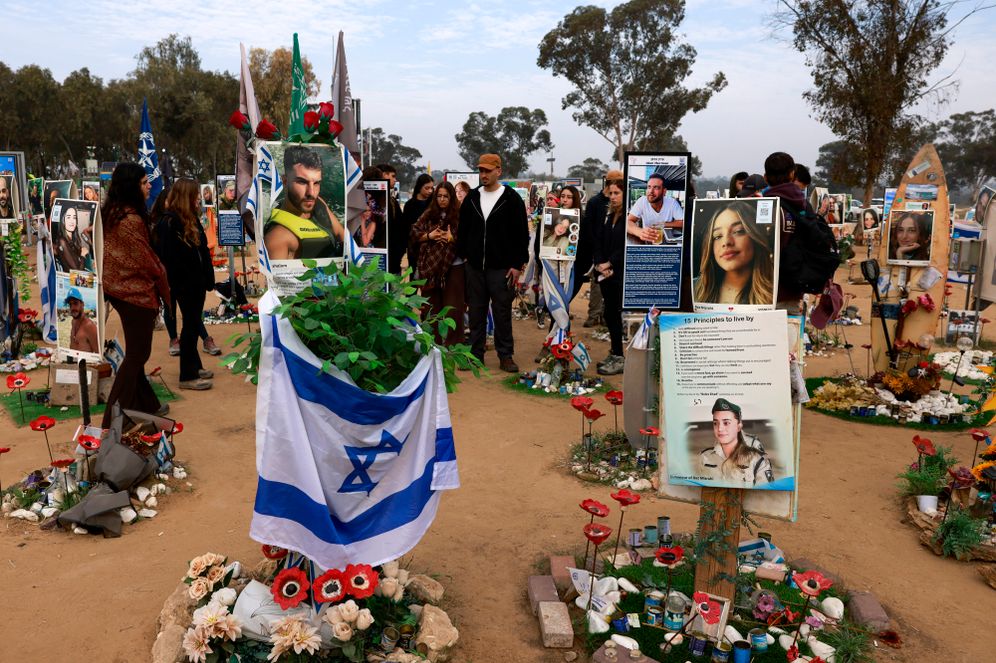 People visit the memorial for October 7 victims at the Nova music festival near Re'im, southern Israel
