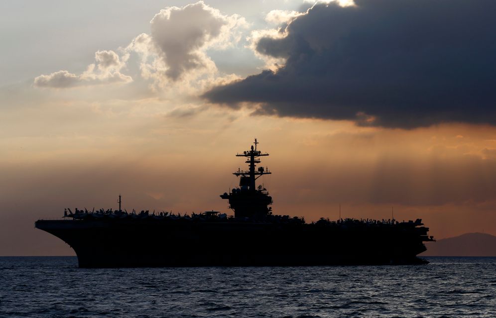AP / Bullit Marquez 2018 © FILE - USS Theodore Roosevelt aircraft carrier is anchored off Manila Bay west of Manila, Philippines, April 13, 2018.