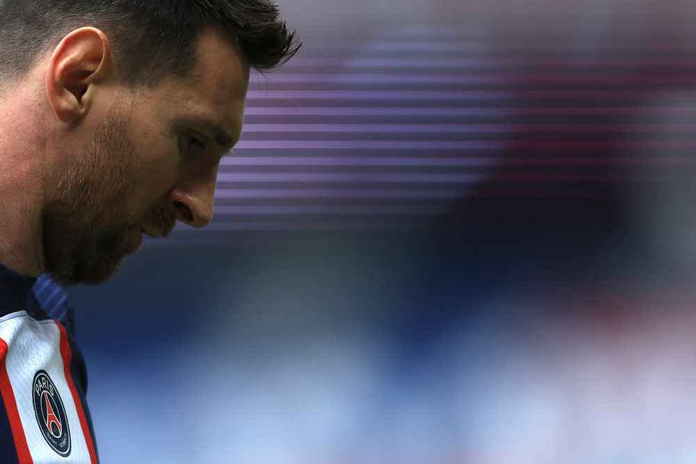 Lionel Messi reacts during a soccer match in Paris, France.