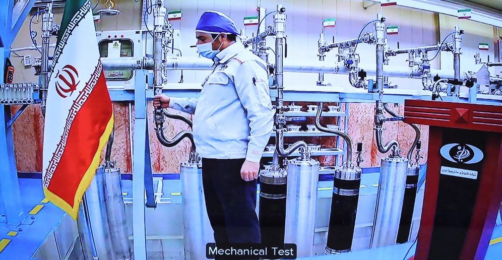 A handout picture provided by the Iranian presidential office on April 10, 2021, shows a grab of a videoconference screen of an engineer inside Iran's Natanz uranium enrichment plant.