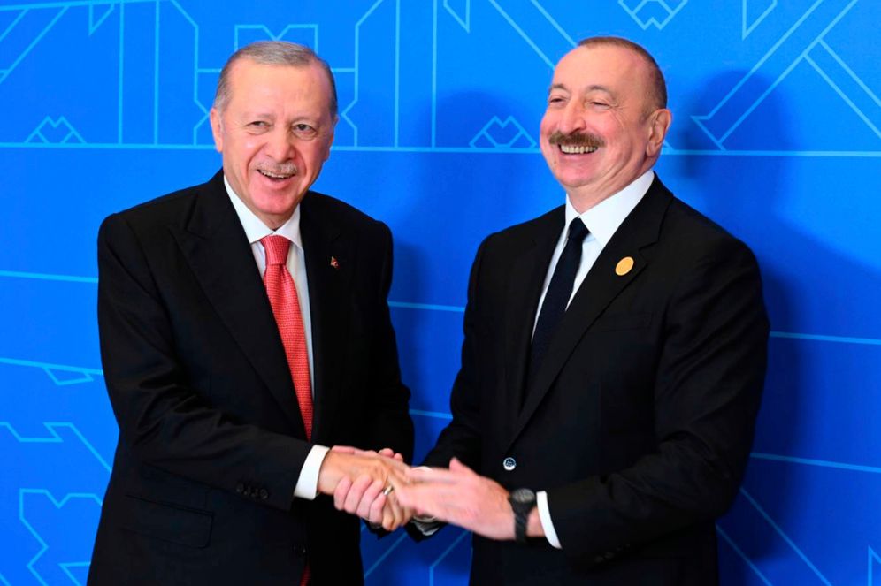 Azerbaijani President Ilham Aliyev, right, and Turkish President Recep Tayyip Erdogan pose for a photo during their meeting on the sidelines of the 17th Summit of the Economic Cooperation Organization (ECO), in the city of Khankendi, Azerbaijan, on Friday, July 4, 2025.
