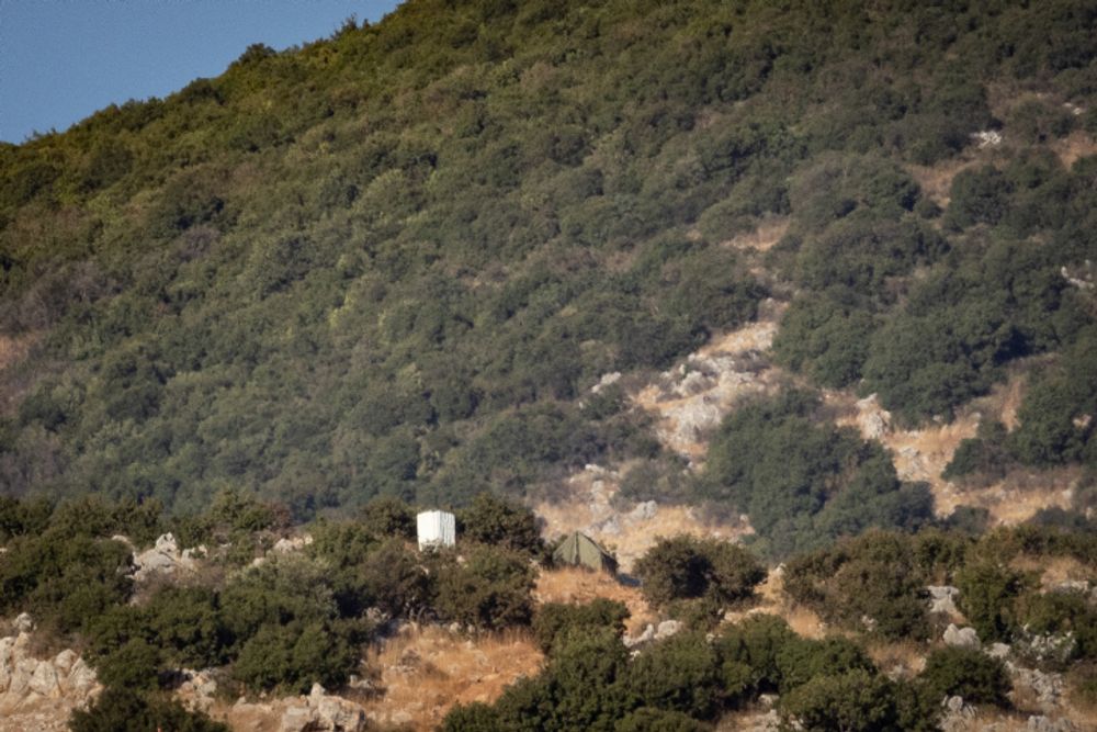 View of a Hezbollah tent that was placed on Israel's sovereign territory, across the Blue Line, as it seen from the Israeli side of the border with Lebanon.