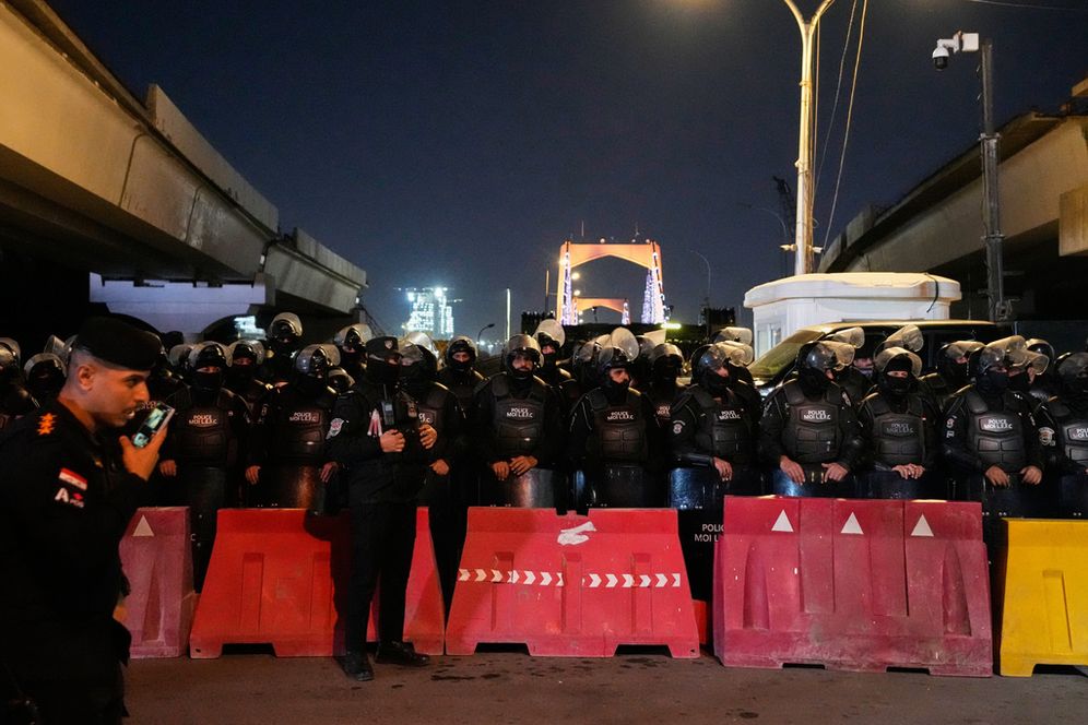 Iraqi security forces close a bridge leading to the Green Zone where the U.S. embassy is located, in Baghdad, Iraq, Saturday, Feb. 28, 2026, during a protest against U.S. and Israeli attacks on multiple cities across Iran. 