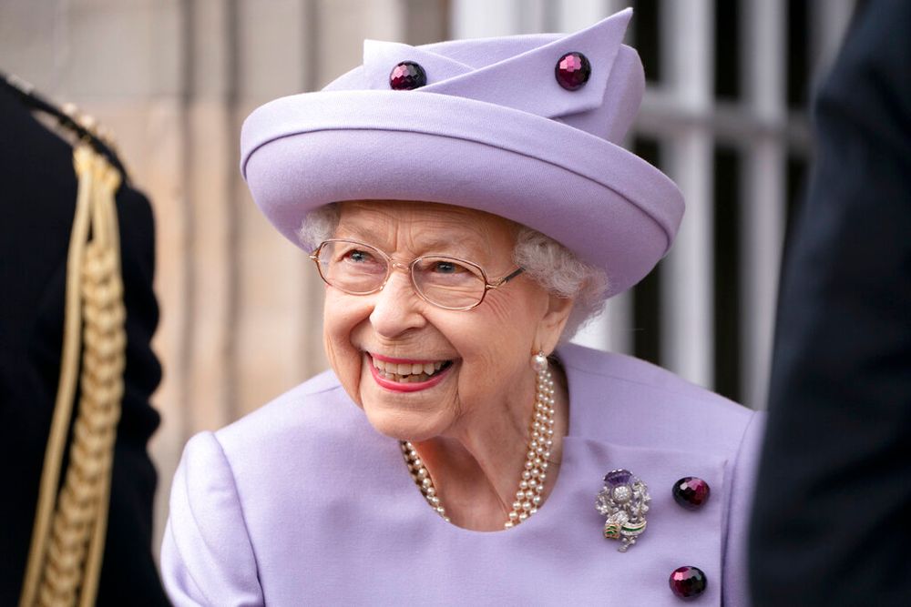 Queen Elizabeth II attends an armed forces act of loyalty parade in the gardens of the Palace of Holyroodhouse, Edinburgh, Scotland, on June 28, 2022.