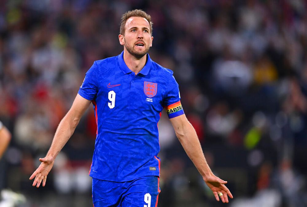 England's Harry Kane celebrates after scoring his side's opening goal during the UEFA Nations League soccer match between Germany and England at the Allianz Arena, in Munich, Germany.
