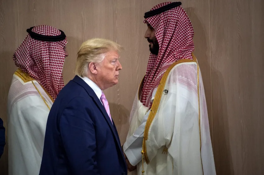 US President Donald Trump and Saudi Arabia's Crown Prince Mohammed Bin Salman (R) arrive for a meeting on "World Economy" at the G20 Summit in Osaka on June 28, 2019.