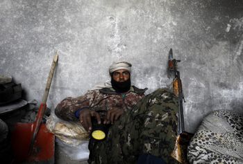 A member of the Sheitaat tribe poses for a picture in the village of Baghouz, eastern Syria, on January 27, 2019.