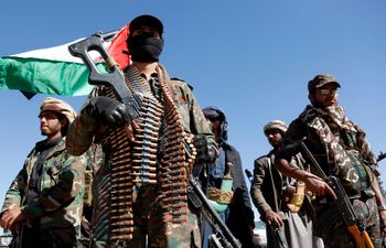 Houthis staging a rally against the U.S. and the U.K. strikes on Houthi-run military sites near Sanaa, Yemen.