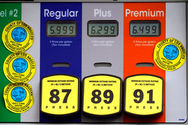 Gas prices are posted at a full-service gas station in California, the United States, November 7, 2021.