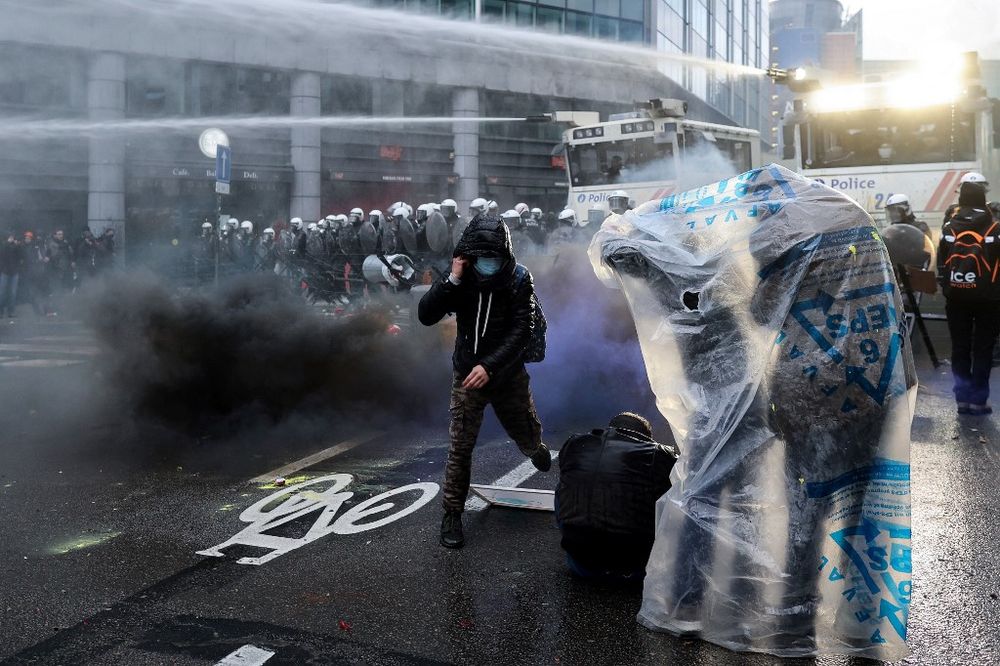 Demonstrators take part in a rally to protest against the government's Covid restrictions in Brussels, Belgium, on December 5, 2021.