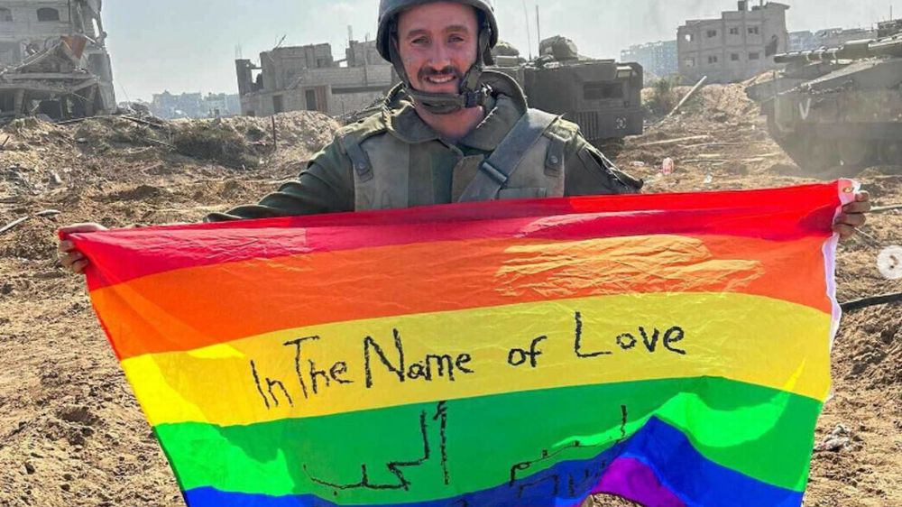 Yoav Atzmuni, IDF solider, waving Pride flag in Gaza