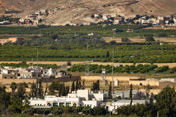 View of the Jordan River Crossing or Sheikh Hussein Bridge, one of the three international border crossings between Jordan and Israel