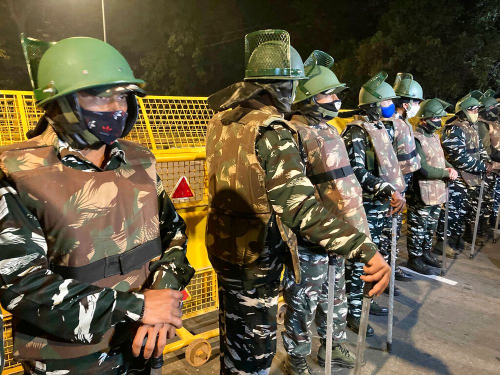 Policemen stand guard near the Israeli Embassy after a blast in New Delhi, India, on January 29, 2021.