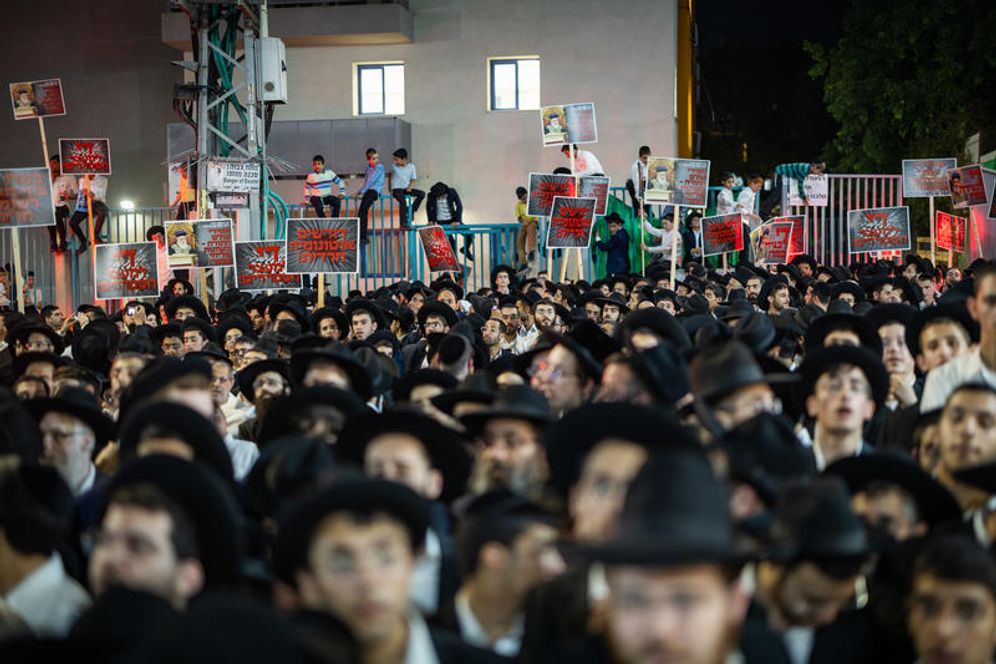 Ultra-Orthodox Jewish men attend a rally against the imprisonment of yeshiva students who failed to comply with military recruitment orders, in Bnei Brak, June 29, 2026. 