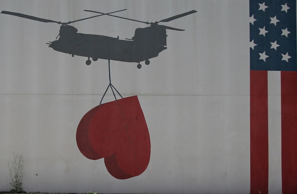 AP Photo/Mariam Zuhaib The US flag is paint on the wall at Embassy of the United States of America in Kabul, Afghanistan, Friday, July. 30, 2021.