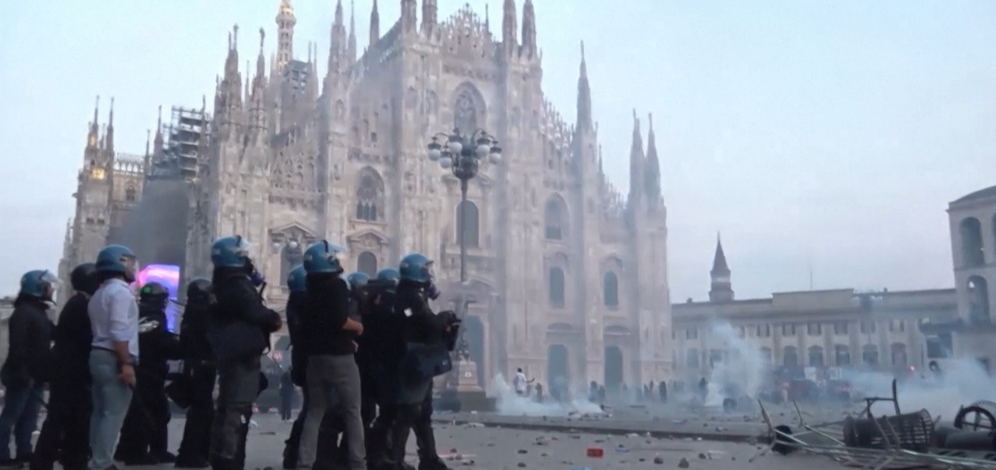 Reuters Italian police outside of the Duomo in Milan, Italy, pushing back protesters. Oct. 18, 2026