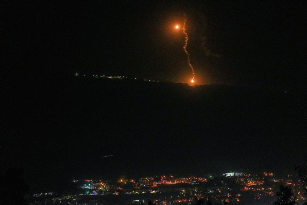Flares dropped by the Israeli military on Hezbollah targets in Lebanon.