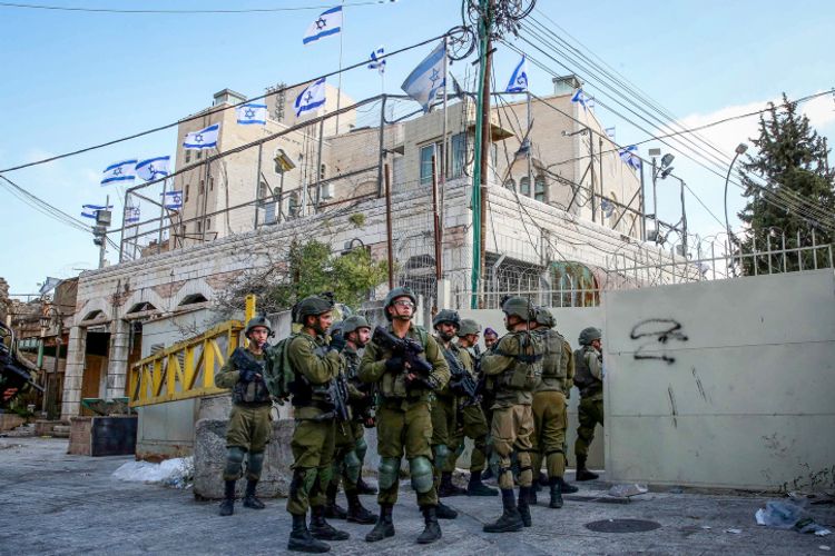 Israeli security forces in the West Bank city of Hebron, on August 13, 2022.