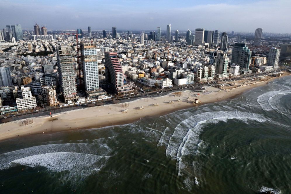 An aerial view of the beaches and city skyline in Tel Aviv, Israel.