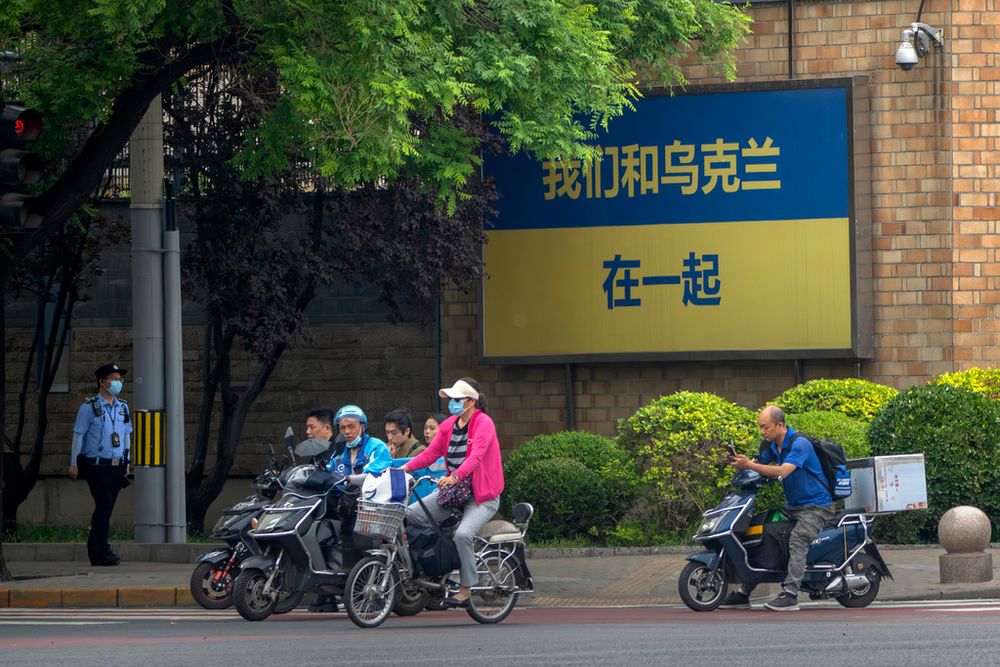 A sign reading "We stand with Ukraine" outside the Canadian Embassy in Beijing, China.