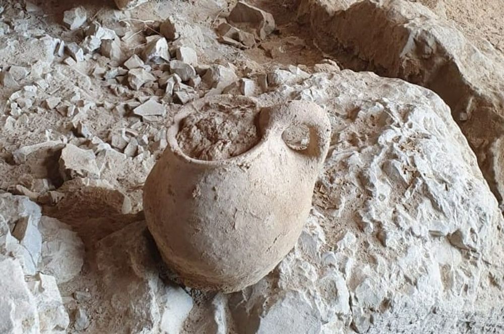 The ancient clay jug discovered at Cave 53 in the Qumran region in southern Israel.