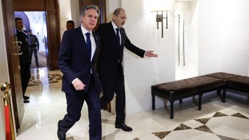 U.S. Secretary of State Antony Blinken walks with Jordanian Foreign Minister Ayman Safadi in Amman, Jordan