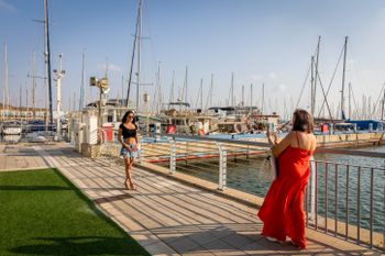 People enjoy the Herzliya Marina in central Israel.