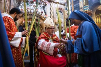Olivier Fitoussi/Flash90 Latin Patriarch of Jerusalem Pierbattista Pizaballa leads the procession on Palm Sunday, in the Church of the Holy Sepulchre, in Jerusalem's Old City on April 10, 2022.