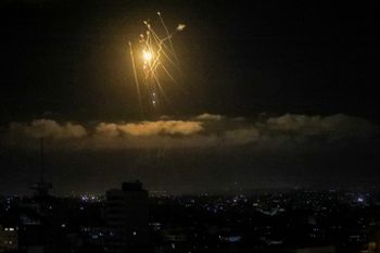 The Iron Dome air defense system launches missiles to intercept rockets fired toward Israel, as seen from Gaza City, Gaza, on April 21, 2022.