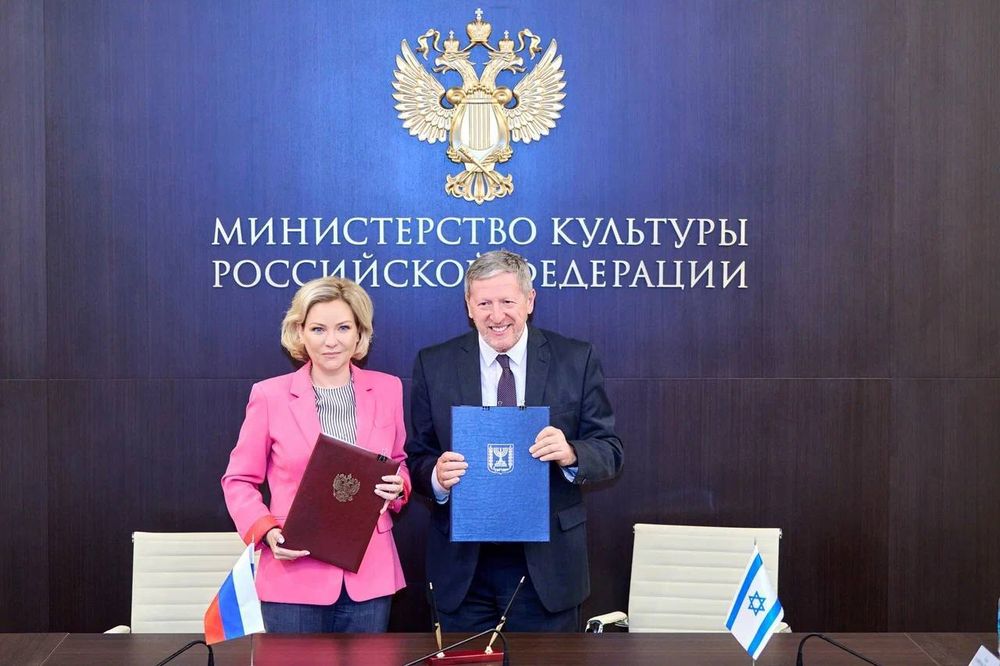 Russian Minister of Culture Olga Lyubimova and Israel's Ambassador to Russia Alexander Ben Zvi during the signing ceremony in Moscow, Russia.
