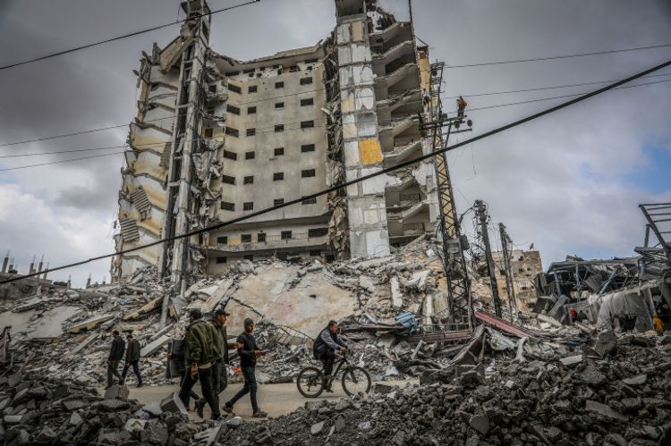 Palestinians at the site of an Israeli airstrike in Rafah, in the southern Gaza Strip, on March 19, 2024.