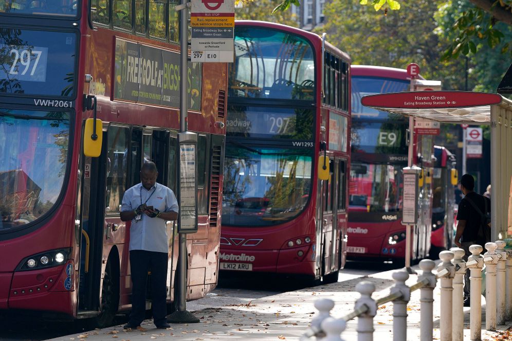 AP Photo/Frank Augstein London busses are parked at Ealing Broadway as some bus routes are on strike in London, Friday, Aug. 19, 2022. A strike by London Underground workers brought the British capital's transit network to a grinding halt on Friday, a day after a nationwide walkout by railway staff. Another rail strike is scheduled for Saturday as the U.K. endures a summer of action by workers demanding pay increases to offset soaring food and energy price hikes.