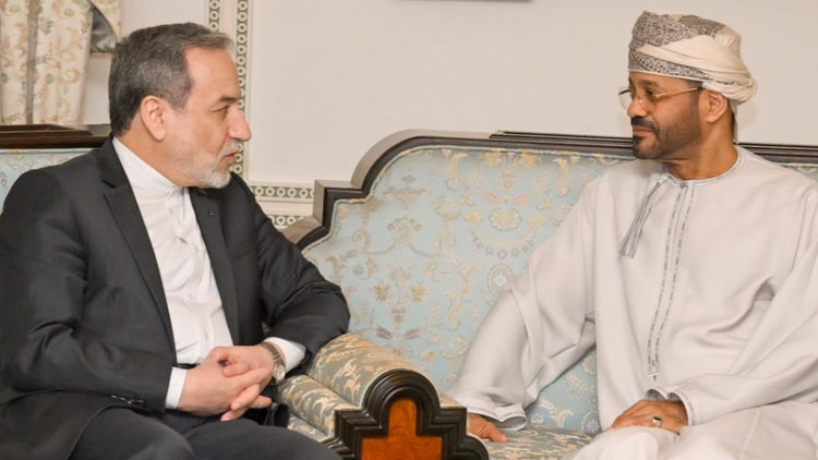 Iran's FM Abbas Araghchi with his Oman counterpart Badr Albusaidi 