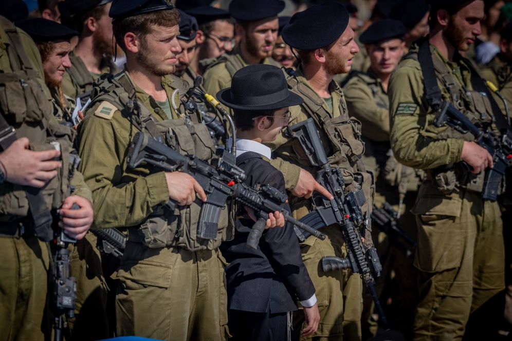 Photo by Chaim Goldberg/Flash90 Ultra orthodox jewish soldiers from the Hasmonean Brigade take part in a beret march after completing seven months of basic and advanced training, at the Western Wall in Jerusalem's Old city on August 6, 2025