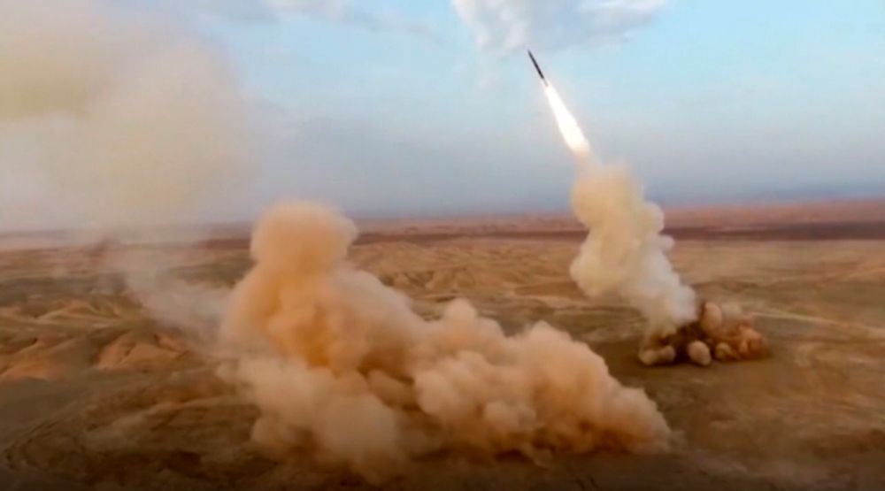FILE - Launching of underground ballistic missiles by the Iranian Revolutionary Guard.