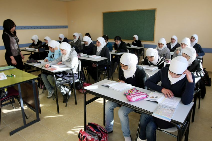 Young Arab girls seen studying during a lesson in the newly opened elementary school in the Arab neighborhood of Umm Tuba, in East Jerusalem. December 13, 2011.