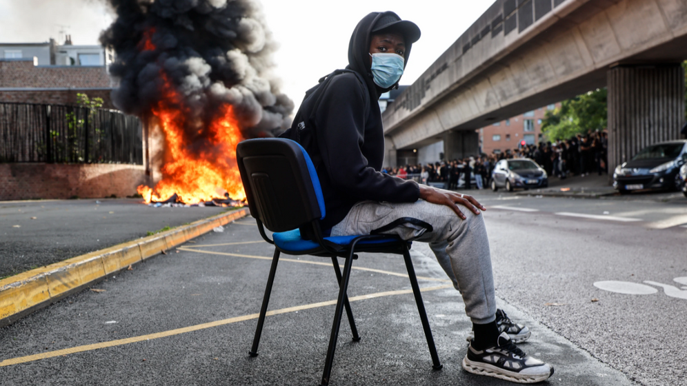 High schoolers burn garbage in Lille, France, October 1, 2026