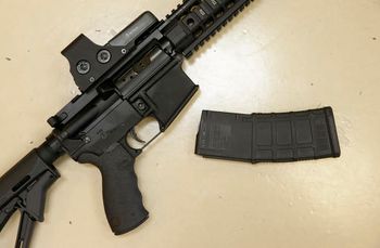A custom-made semi-automatic hunting rifle with a high-capacity detachable magazine is displayed at TDS Guns in Rocklin, California, October 3, 2013.