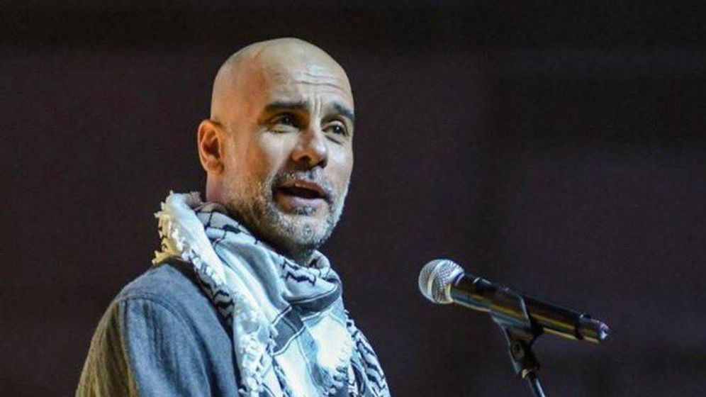 Pep Guardiola donning a keffiyeh in an endorsement of the Palestinian cause 