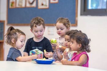 Israeli children learn about the customs of Rosh Hashana, ahead of the Jewish holiday, at a kindergarten in Moshav Yashresh.