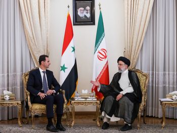 A handout picture provided by the Iranian presidency on May 8, 2022 shows Iranian President Ebrahim Raisi (R) receiving Syrian President Bashar al-Assad in the capital Tehran, Iran.