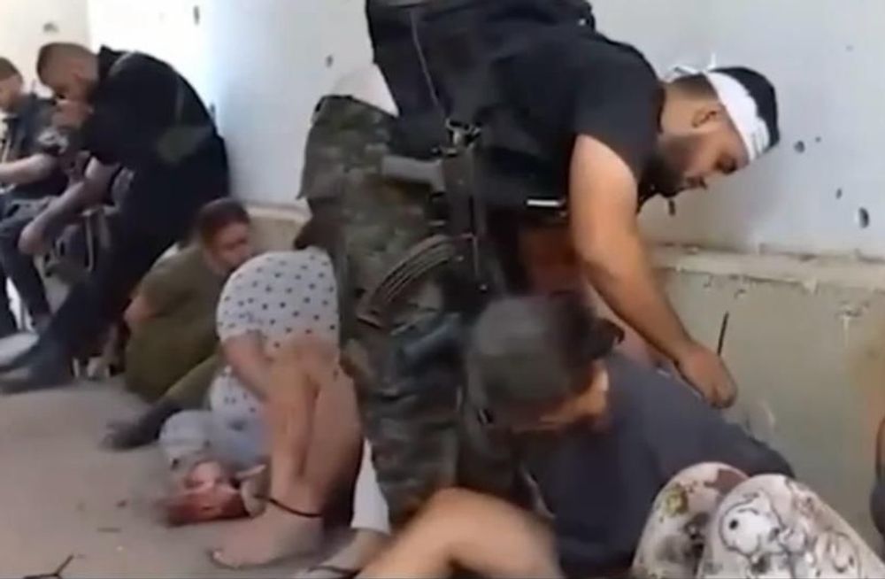 Screenshot of a video showing the kidnapping of female soldiers at the Nahal Oz base on October 7