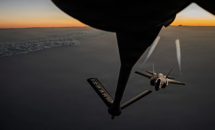 A US Air Force KC-135 Stratotanker aircraft refuels a F-35A Lightning II aircraft during Operation Epic Fury in the US Central Command area of responsibility April 5, 2026.