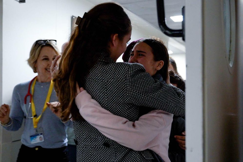 IDF Spokesperson Sahar Kalderon reunites with a family member at Ichilov hospital, in Tel Aviv.