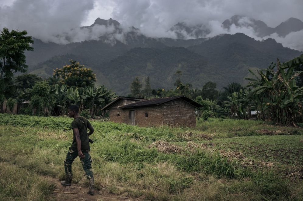 A Congolese soldier patrols the village of Mwenda, recently attacked by the armed group Allied Democratic Forces (ADF), in the Democratic Republic of Congo, on May 23, 2021.