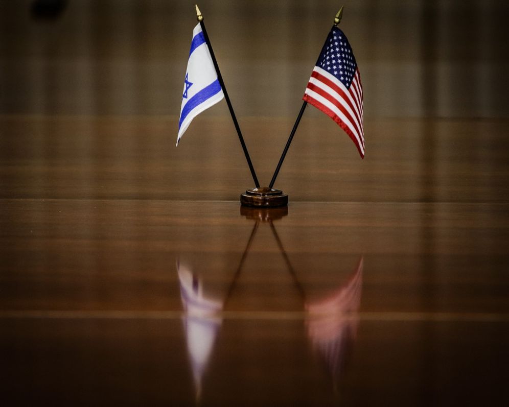 US and Israeli flags adorn a table at the Pentagon in Washington, DC, United States.