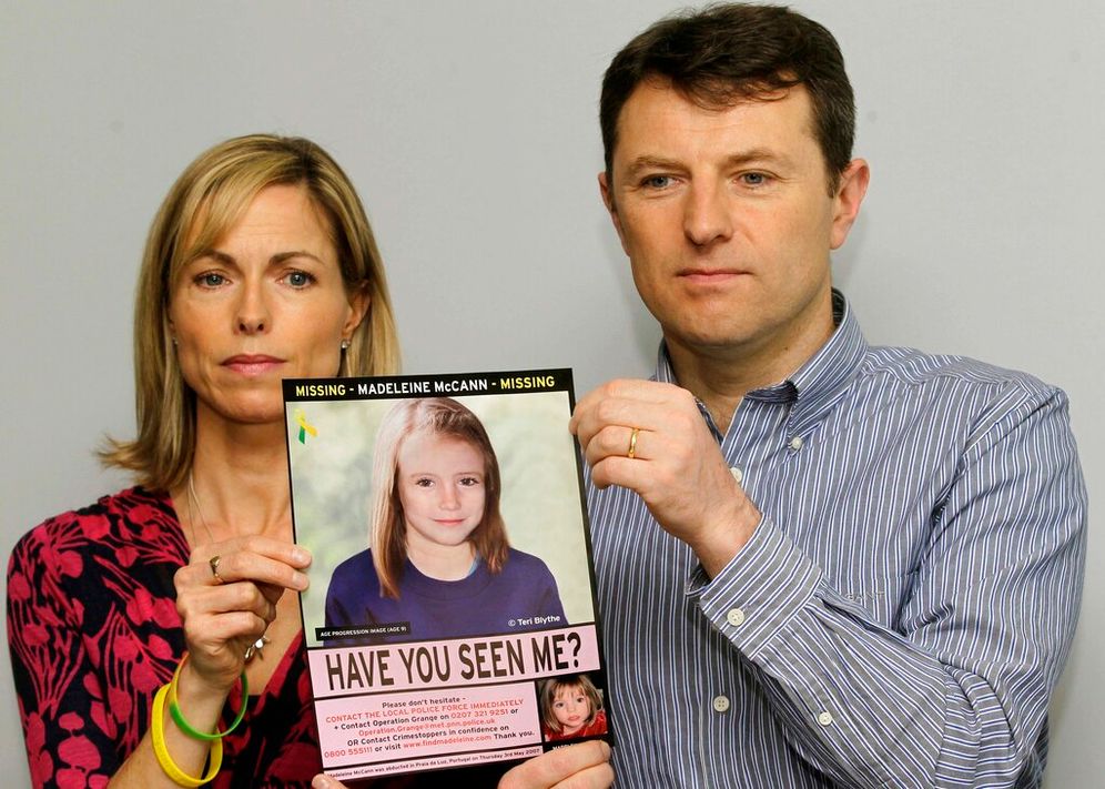 Kate and Gerry McCann pose for the media with a missing poster depicting an age progression computer generated image of their still missing daughter Madeleine during a news conference in London, England.